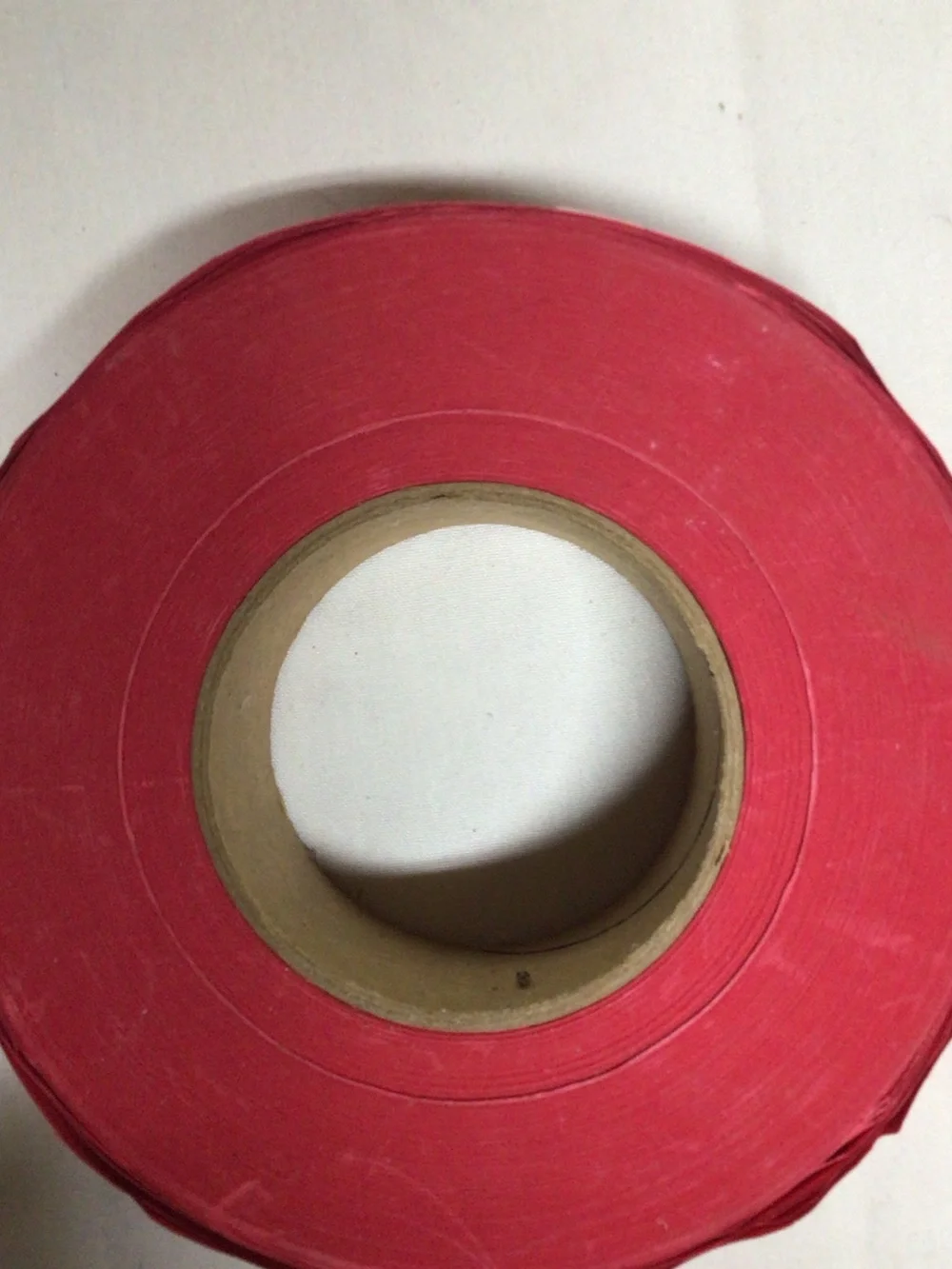 Source Unknown Red Raffle Ticket Roll with Black Print